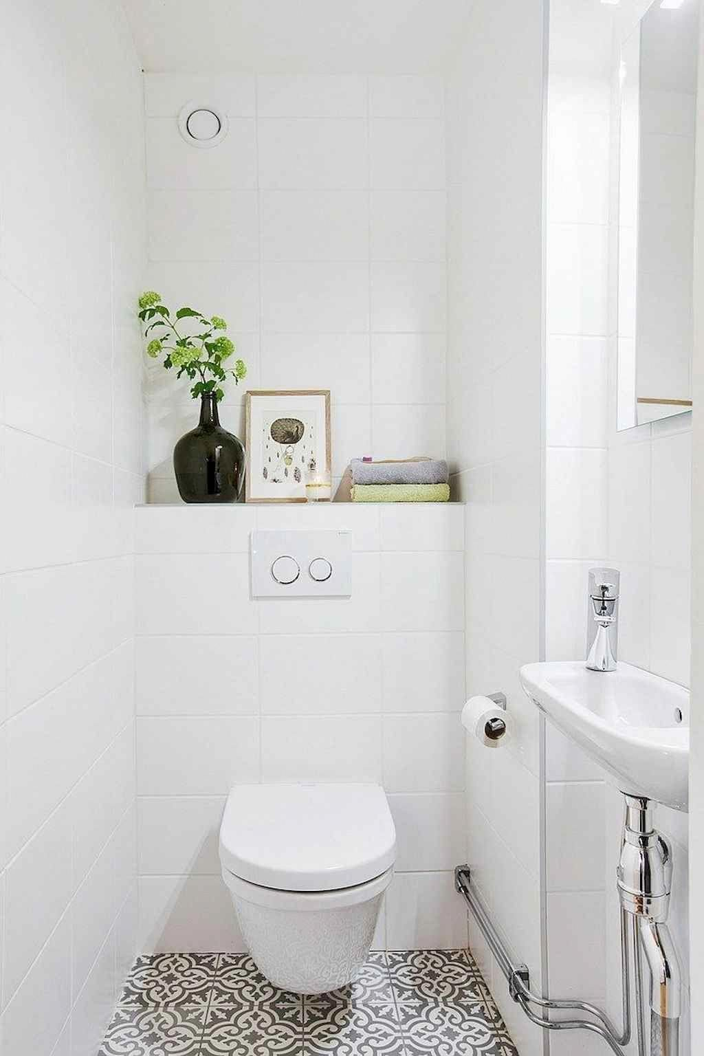 Mẫu nhà vệ sinh tông trắng thiết kế nhỏ gọn và đơn giản